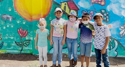 Celebran Encuentro de Culturas Vivas con mural en colonia blanca Navidad