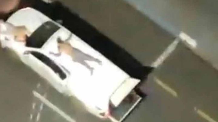 VIDEO: Ladrones de banco atan a rehenes a sus carros como escudos humanos para huir