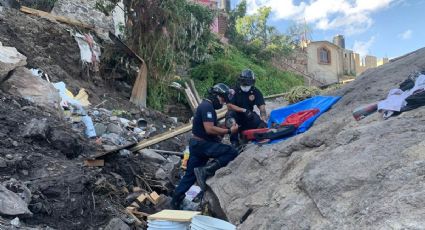 Localizan cuerpo de menor entre escombros del Cerro del Chiquihuite