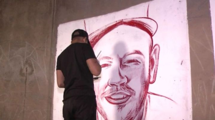 Realizan mural de Residente con sangre humana