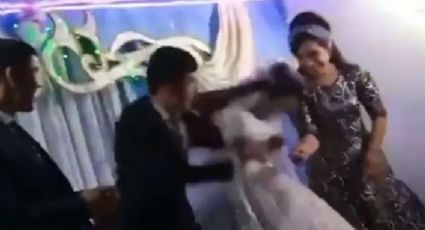 INDIGNANTE... Hombre golpea a su esposa en plena fiesta de la boda (VIDEO)