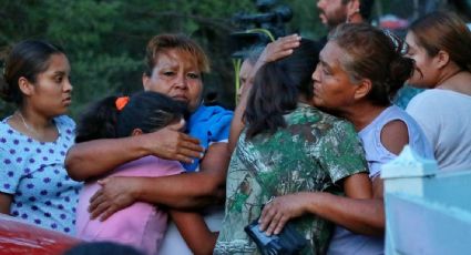 Familias de mineros firman acuerdo de conformidad con gobierno; recibirán indemnización