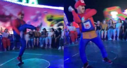 ¿Y la monja? Captan a Mario Bros bailando en juego mecánico | VIDEO