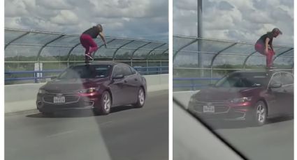 Captan a mujer caminando sobre auto en puente internacional | VIDEO