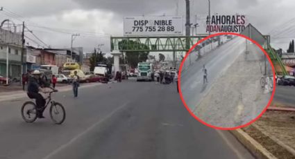 Momento exacto en el que hombre se avienta a un camión | IMÁGENES FUERTES