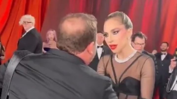 Lady Gaga evita caída de fotógrafo en Premios Oscar; en redes lo señalan por acoso | VIDEO
