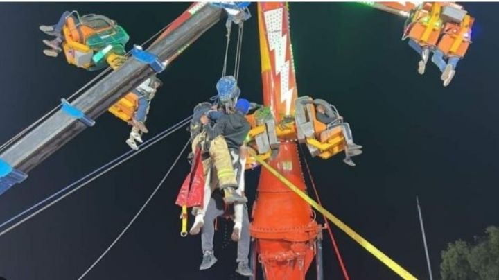 Quedan atrapadas 24 personas en juego mecánico a 20 metros de altura; sufren crisis nerviosa
