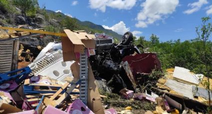 Hallan tráiler despedazado en barranco; había una persona muerta