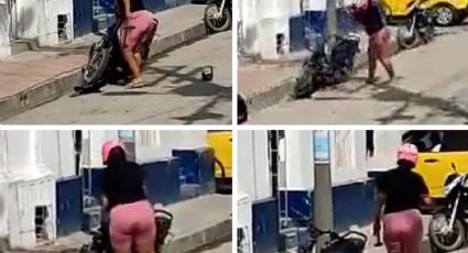 Mujer destroza con martillo moto de su esposo, estacionada afuera de un hotel