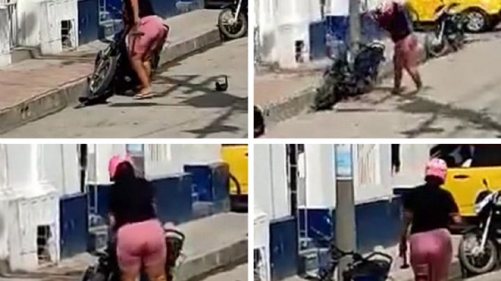 Mujer destroza con martillo moto de su esposo, estacionada afuera de un hotel