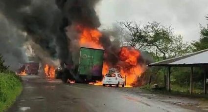 Incendian 13 tráileres en carretera de Veracruz; protestan por asesinato de activista