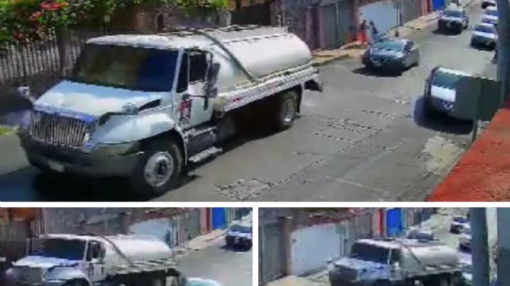 Pipa se va de reversa en pendiente e impacta contra tres vehículos | VIDEO