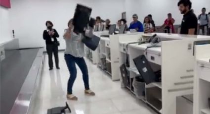 Mujer exige a aerolínea reembolso mientras hace destrozos en el AICM