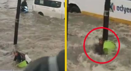 Abuelita es arrastrada por corriente de agua tras fuerte tormenta | VIDEO