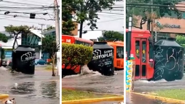 Tinaco arrastrado por fuertes corrientes choca contra dos autobuses en Guadalajara | VIDEO