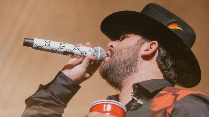 ¿Amenazan a Luis R Conriquez?; dos hombres quisieron bajarlo del escenario | VIDEO