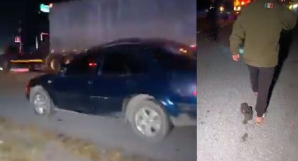 Hombre intenta cruzar a pie carretera y muere despedazado por tráileres 