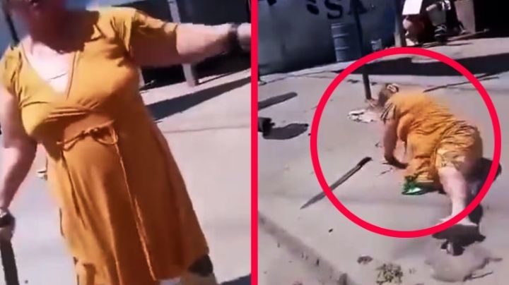 Mujer amenaza con machete a trabajador de la CFE; termina con el brazo lastimado | VIDEO