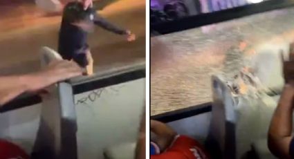 Policía lanza piedra a camión con aficionados de Chivas, rompe el vidrio I VIDEO