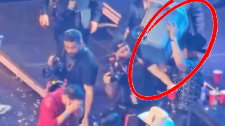 Eduin Caz arroja hielera en pleno concierto y lo critican en redes sociales