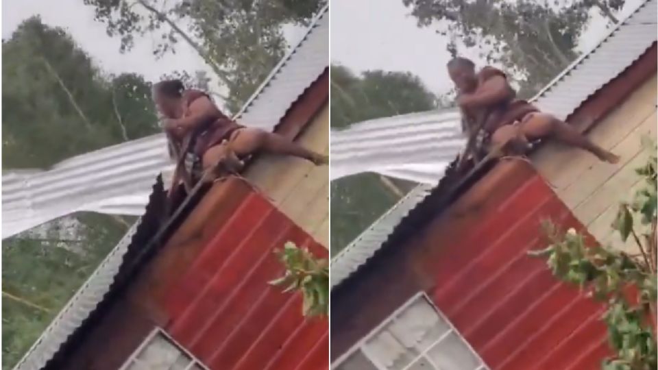 Mujer se aferra al techo para evitar que salga volando durante huracán Beryl