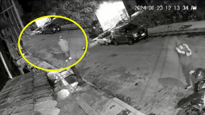 Hombre se salva de asalto y balacera; regresa por su caguama y se le cae al piso | VIDEO