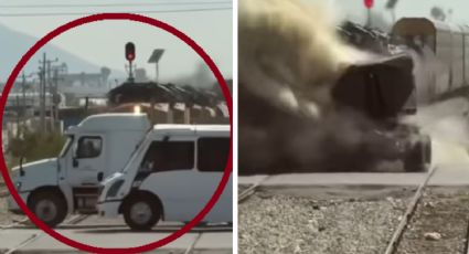 Tráiler de doble remolque quiere ganarle el paso al tren... ¡y lo parten en dos! | VIDEO