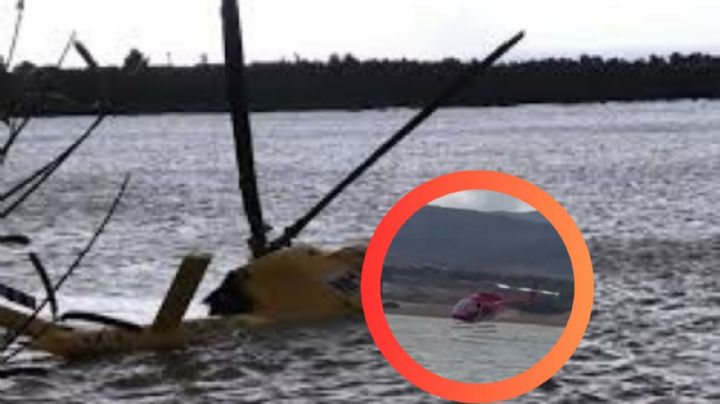 Helicóptero que recolectaba agua se estrella en presa; rescatan a 2 personas | VIDEO