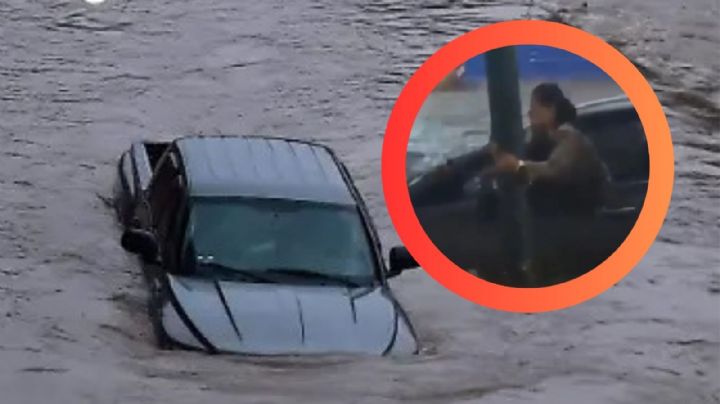 Tormenta en León deja a mujer atrapada en su auto; se aferró a poste para no ser arrastrada | VIDEO